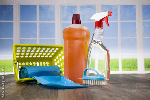 Cleaning products. Home concept and window background