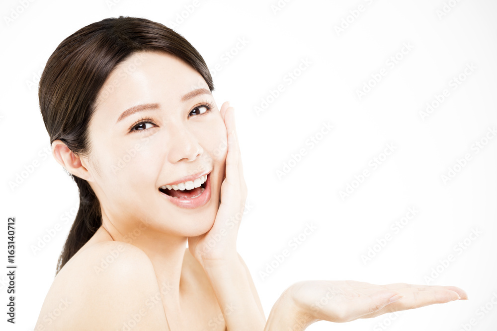 happy Beauty woman showing beauty product on her hand . happy Beauty woman showing beauty product on her hand .
