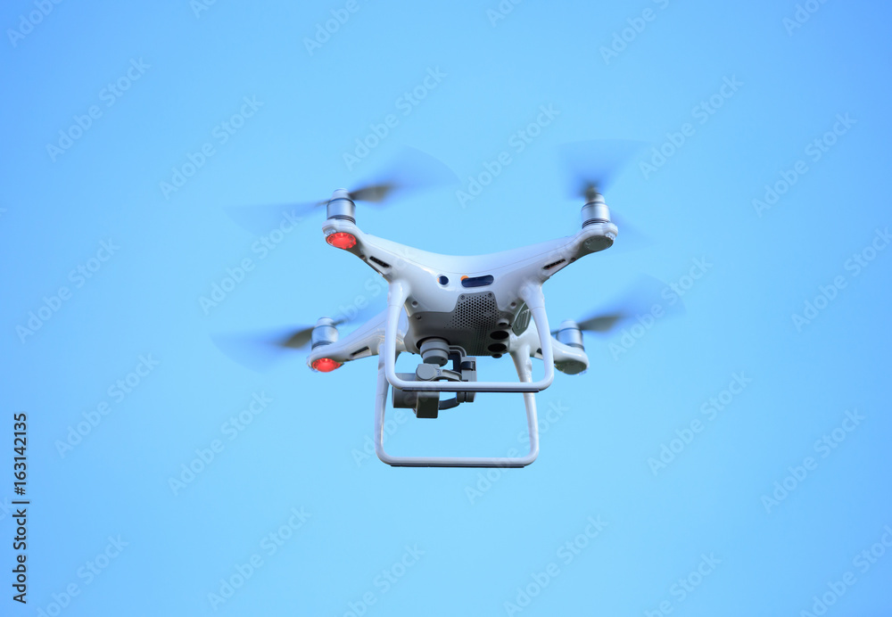 Flying drone with camera on the sky Flying drone with camera on the sky