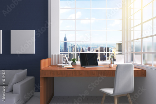 3D Rendering : illustration of modern interior Creative designer office desktop with computer. pc laptops mock up working place of graphic design at house. light from outside. brick wall background