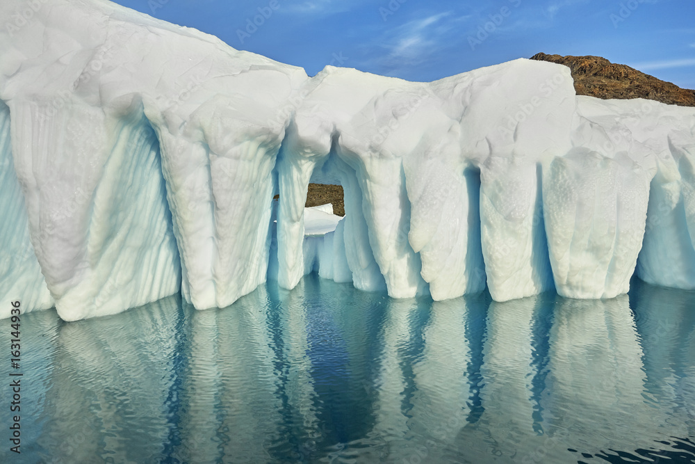 iceberg-floating-in-greenland-fjord-stock-photo-adobe-stock