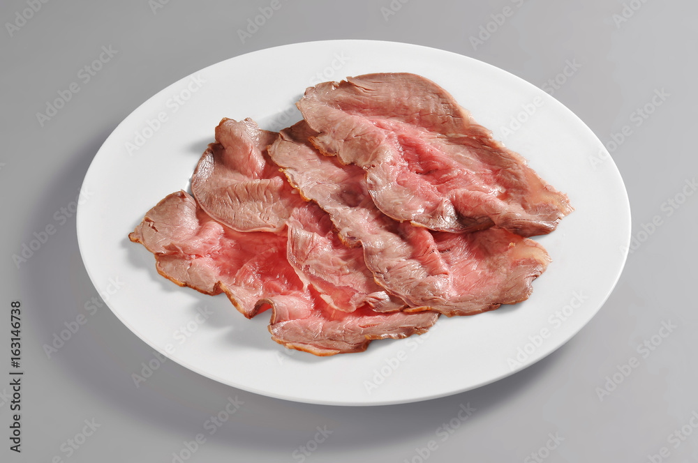 Plate with slices of roast beef