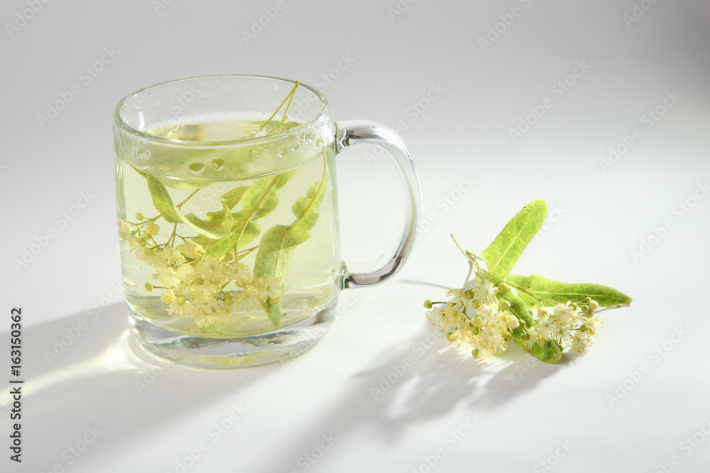 Lime tea in a glass cup