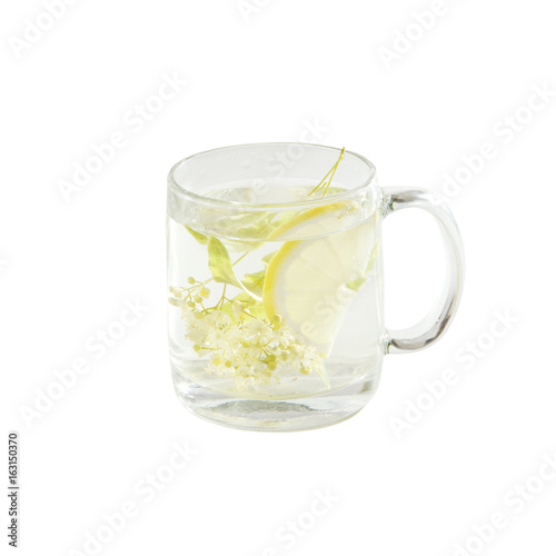 Lime tea with lemon in a glass cup