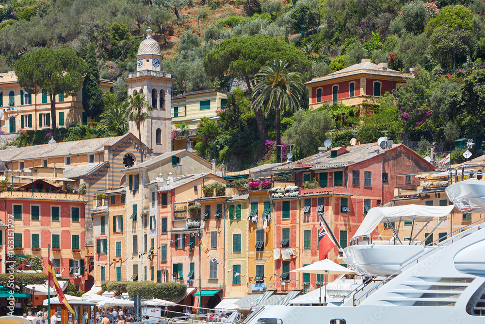 Portofino typical beautiful village with colorful houses and bell tower in Italy, Liguria sea coast