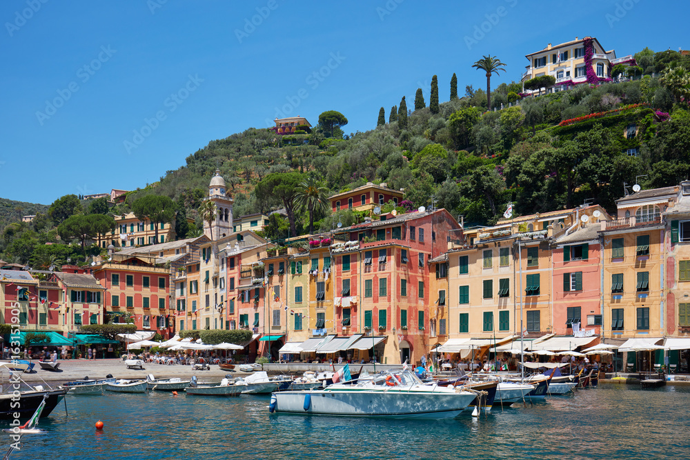 Portofino typical beautiful village with colorful houses and small harbor in Italy