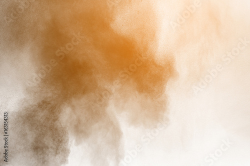 Freeze motion of colored powder explosion isolated on white background.