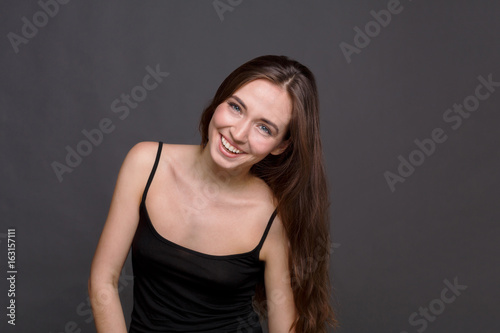 Young laughing attractive woman portrait