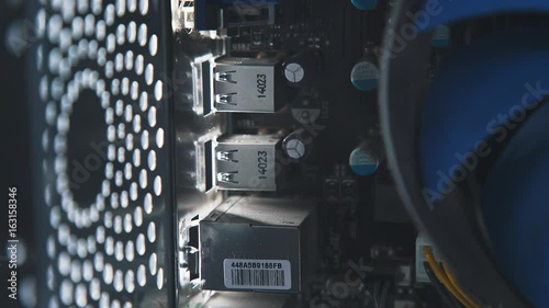 Computer cooling system. Fan in a personal computer. Modern ventilation device. Cooling the microprocessor in a digital device. photo