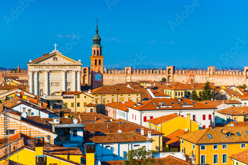 Italian city skyline. Walled town of Cittadella. Cityscape of the Medieval fortress-town. Text in Latin: "The Temple of Heaven and the Gate"