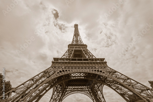 Eiffel tower in Paris against clouds