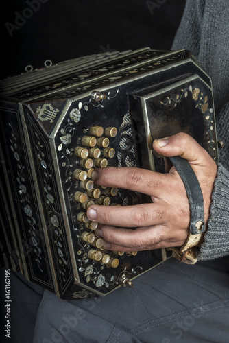 Musician playing bandoneon