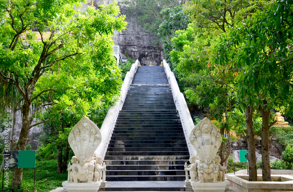 Gate entrance with naga staircase for people walking go to praying and visit Lord Buddha image line appearing