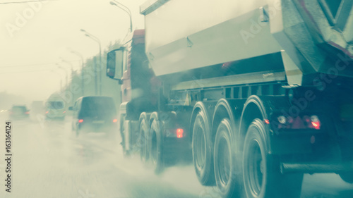 Billede på lærred Traffic in heavy rainfall, no visibility