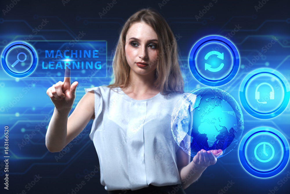 The concept of business, technology, the Internet and the network. A young entrepreneur working on a virtual screen of the future and sees the inscription: Machine learning The concept of business, technology, the Internet and the network. A young entrepreneur working on a virtual screen of the future and sees the inscription: Machine learning