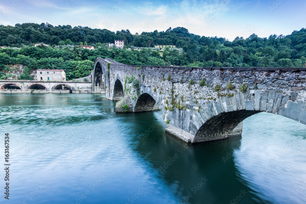 Maddalena Bridge over the Serchio river in Tuscany Italy