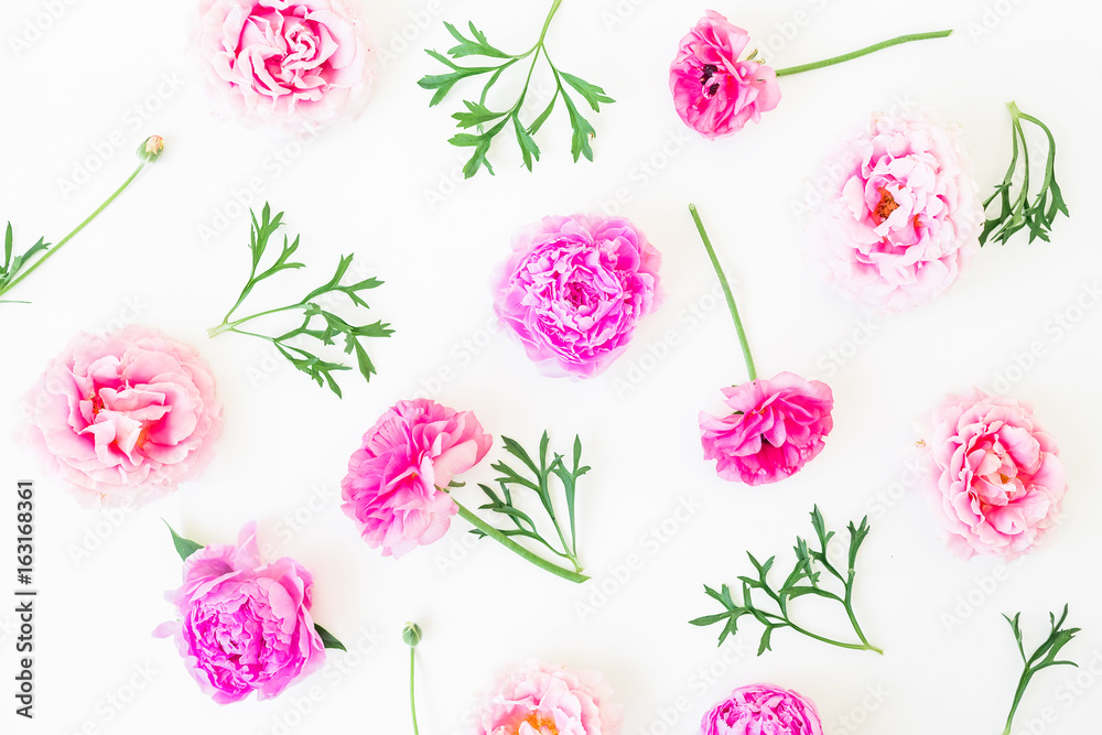 Summer floral composition of peony flowers, roses and leaves on white background. Flat lay, top view.