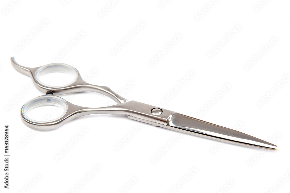 Professional hairdressing scissors isolated on white background Professional hairdressing scissors isolated on white background
