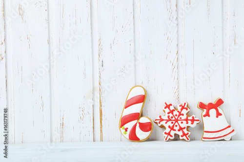 Christmas cookies on a white wall paneling background