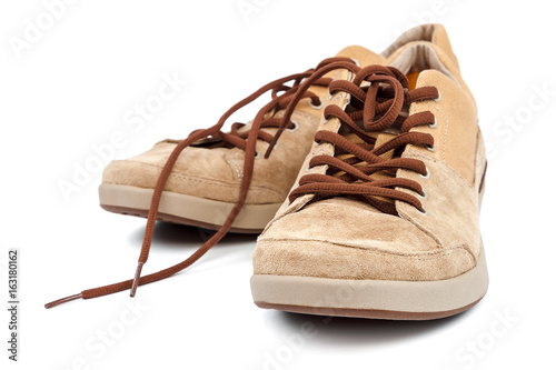 Fashionable sneakers shoes moccasins on white background