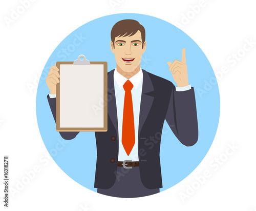 Businessman holding the clipboard and pointing up