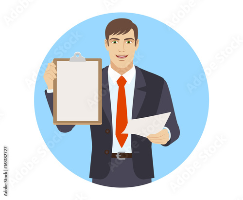 Businessman with paper holding the clipboard