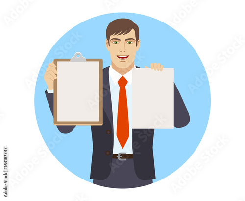Businessman holding the clipboard and paper