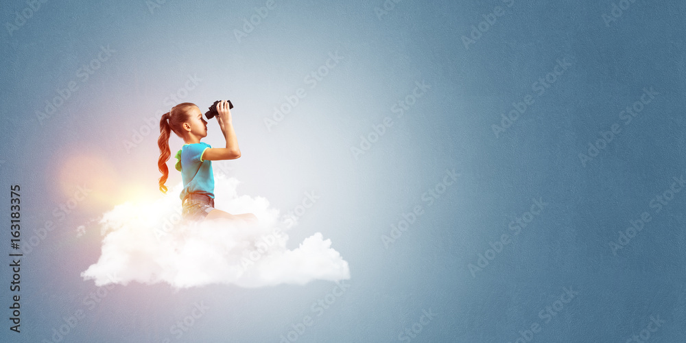 Concept of careless happy childhood with girl dreaming about future Concept of careless happy childhood with girl dreaming about future