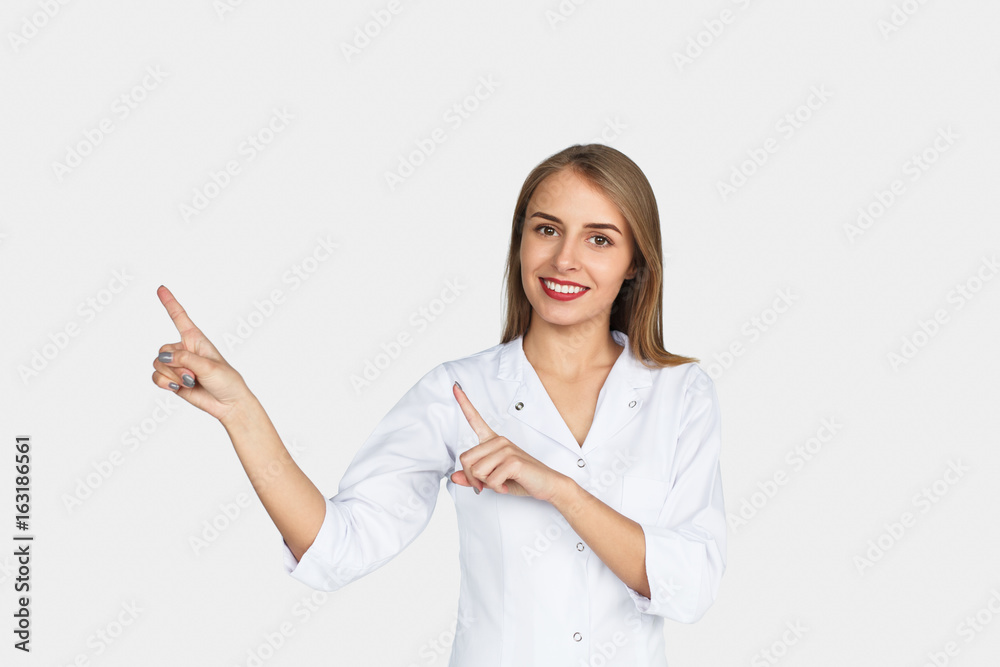 Smiling girl pointing away both hands Smiling girl pointing away both hands
