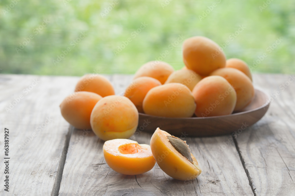 Apricots on a wooden table