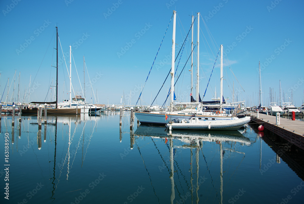 White yachts in the port waiting. Misano Adriatico, Emilia Romagna, Italy
