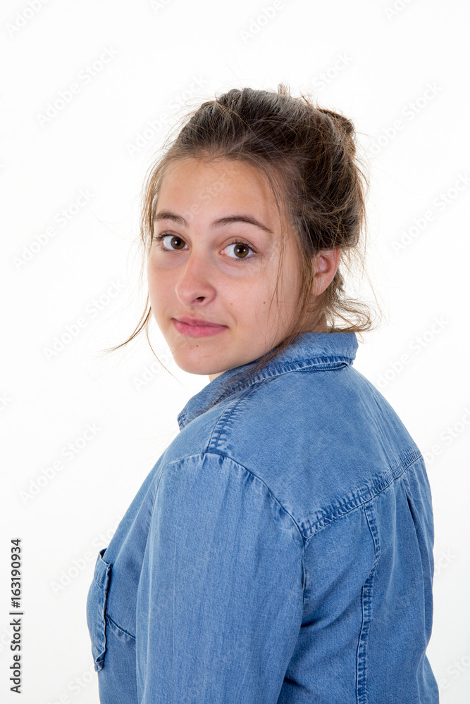 Headshot Portrait of happy ginger girl with freckles smiling looking at camera. White background. Headshot Portrait of happy ginger girl with freckles smiling looking at camera. White background.
