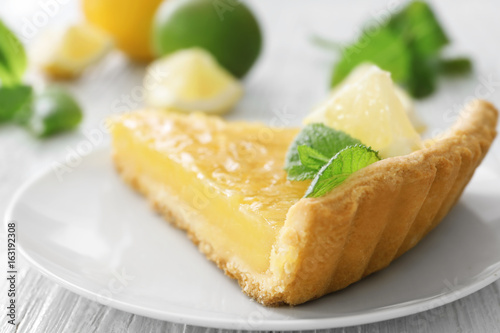A piece of lemon pie served on plate
