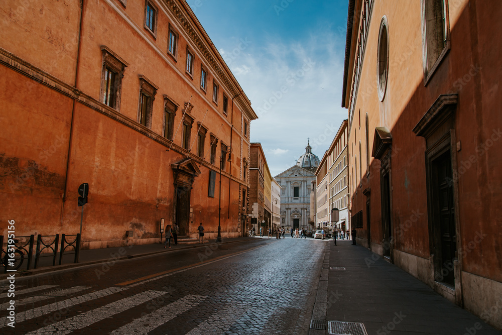 Street in Rome at summer daytime. Italy, Europe