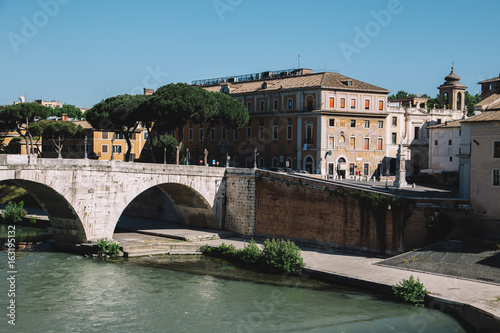 Bridge over Tiber river at summer morning. Rome, Italy
