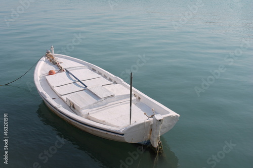 row boat on water sea ocean  stock, photo, photograph, image, picture, © cheekylorns