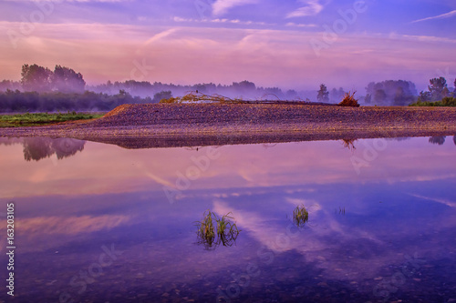 Obraz na płótnie Wild river landscape with sunset blue colors w salonie