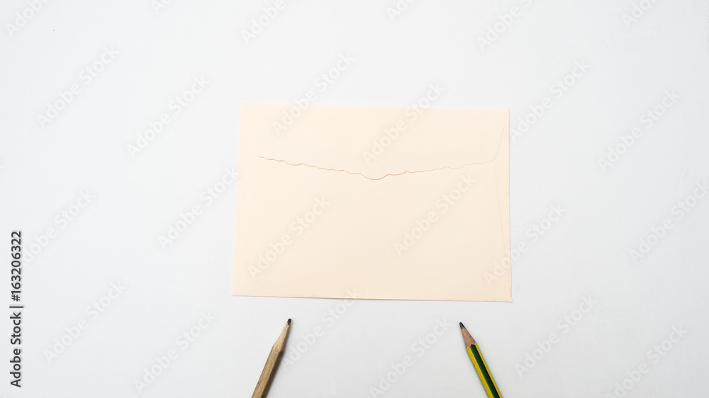 wood pencil and envelope on white background wood pencil and envelope on white background