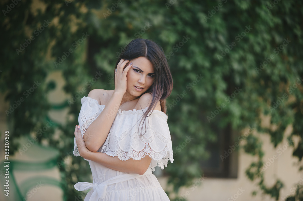 brunette in a dress brunette in a dress