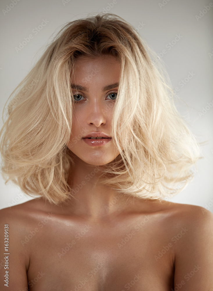 Fototapeta premium Adorable blond woman with healthy, clean complexion
