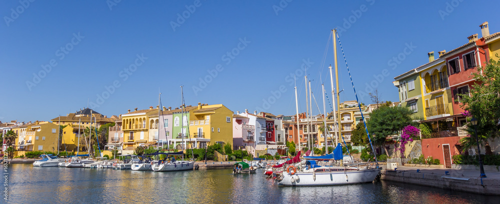 Panorama of boats and colorful houses of Port Saplaya in Valencia