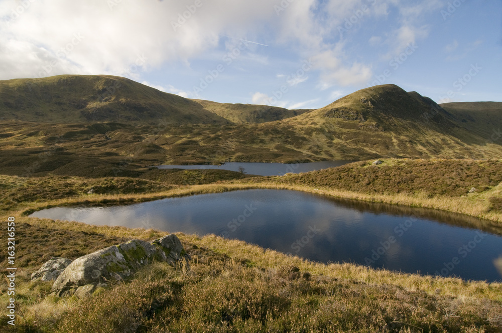 Fototapeta premium Hoggs Well looking towards Lock Skene above the Grey Mares Tail