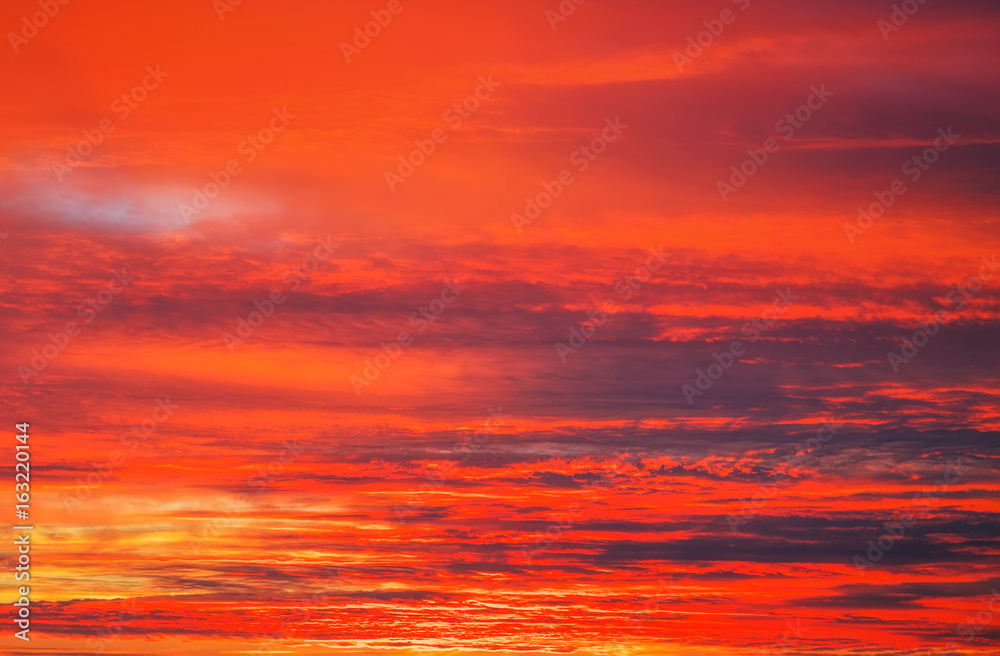 Beautiful fiery orange sunset sky as background.