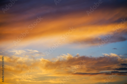 Beautiful stormy sunset sky. Cloudy abstract background.