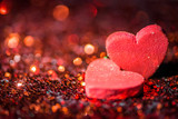 Defocused Heart and abstract red Bokeh lights background.