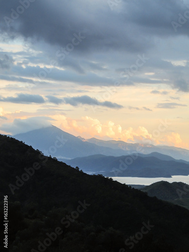 Cloudy view from the mountains in Gocek, Turkey - beach town of Fethiye below