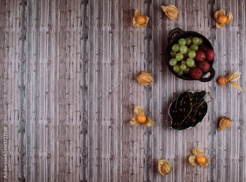 Organic physalis, green grapes and gooseberries.