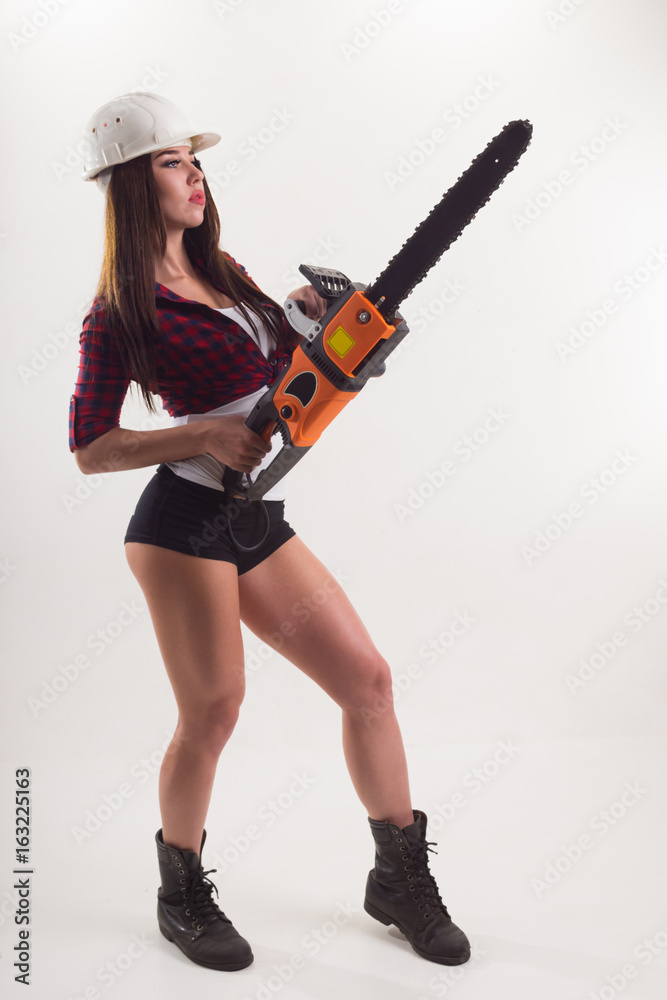 Girl in uniform builder and in helmet Girl in uniform builder and in helmet