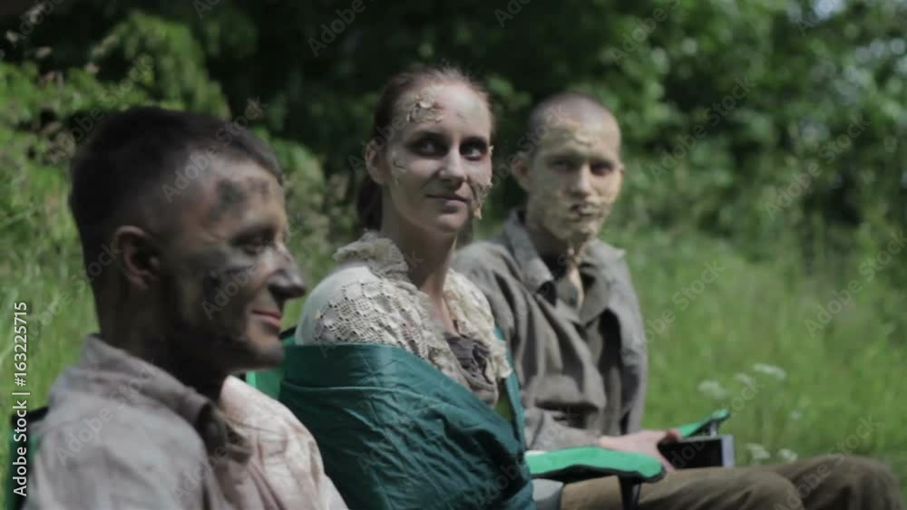 Makeup masters create zombies in the open air. Makeup masters create zombies in the open air.