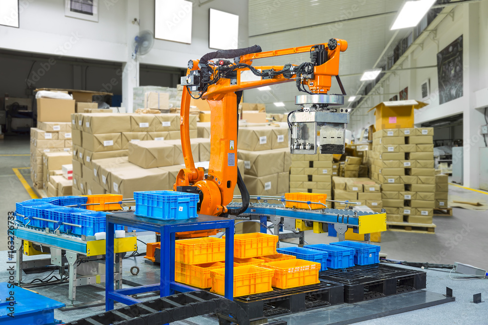 Foto Stock Controller of industrial robotic arm for performing, dispensing,  material-handling and packaging applications in production line  manufacturer factory. | Adobe Stock
